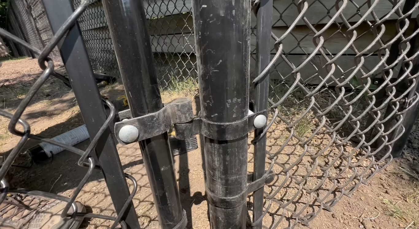 Quality chain-link fence hardware installation detail showing professional craftsmanship